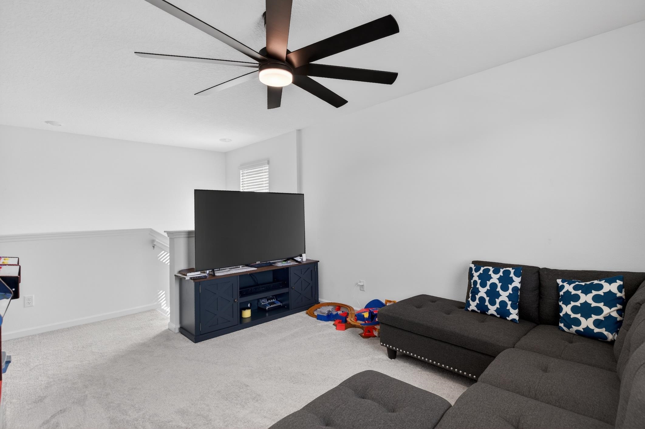 177 White Rabbit Run St. Augustine, FL 32092 - Photo 28 of 53 Living room featuring carpet floors and ceiling fan