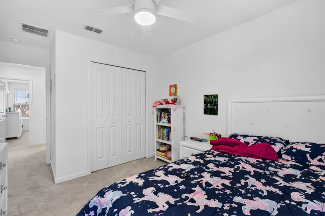 a bathroom with a sink vanity and a mirror