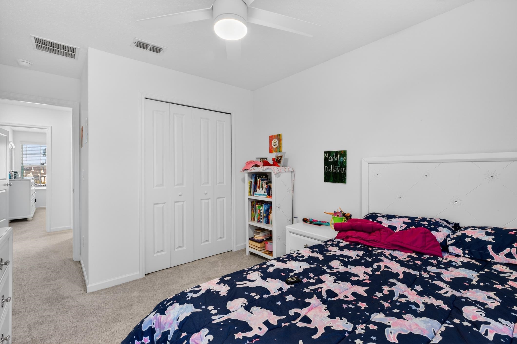 177 White Rabbit Run St. Augustine, FL 32092 - Photo 39 of 53 Bedroom featuring a closet, light carpet, and ceiling fan