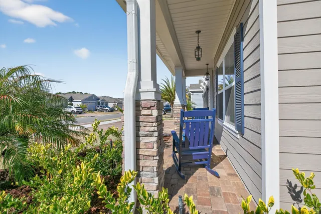 a view of balcony with furniture