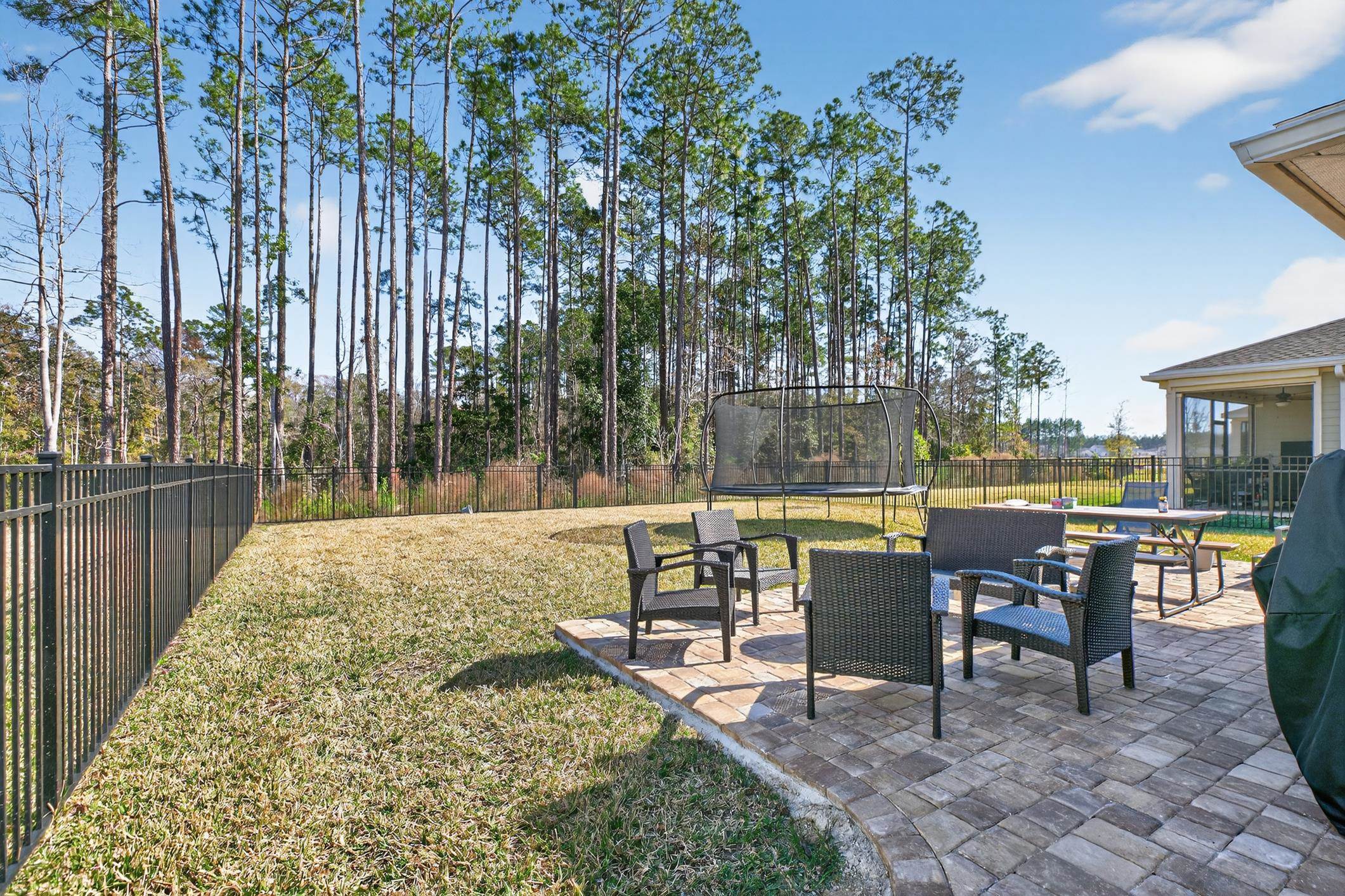 177 White Rabbit Run St. Augustine, FL 32092 - Photo 9 of 51 a view of swimming pool with outdoor seating and plants