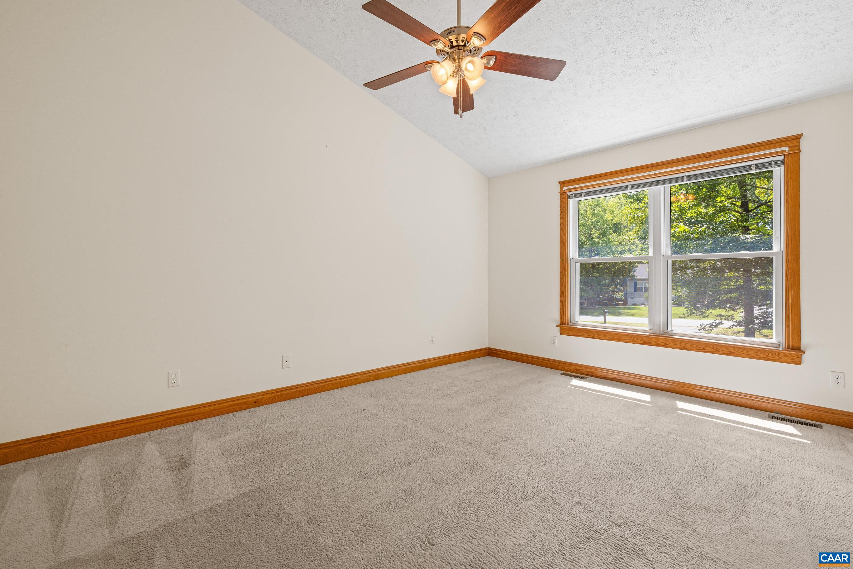 90 Riverside Drive Palmyra, VA 22963 - Photo 21 of 30 an empty room with a window and a fan