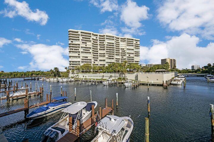 4101 North Ocean Boulevard, Unit 1008 Boca Raton, FL 33431 - Photo 34 of 45 a view of a lake with tall buildings