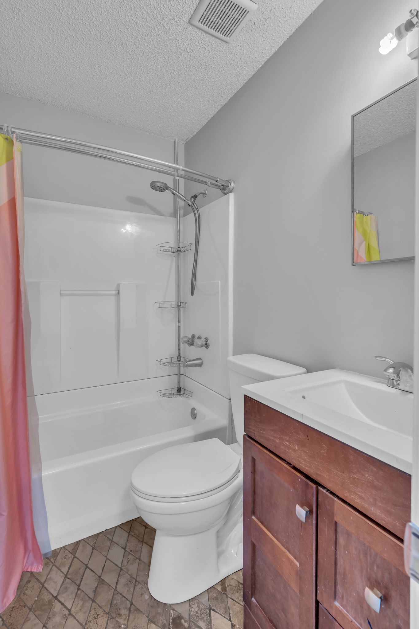 4643 Forest Ridge Drive Hermitage, TN 37076 - Photo 17 of 32 a bathroom with a sink a toilet and shower