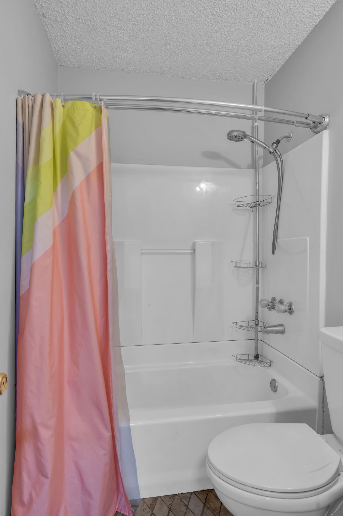 4643 Forest Ridge Drive Hermitage, TN 37076 - Photo 18 of 32 a bathroom with a shower a toilet and sink