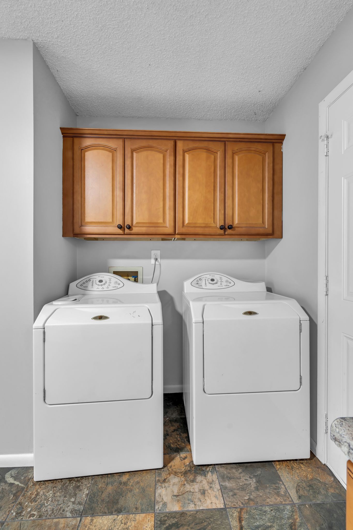 4643 Forest Ridge Drive Hermitage, TN 37076 - Photo 23 of 32 a utility room with dryer and washer