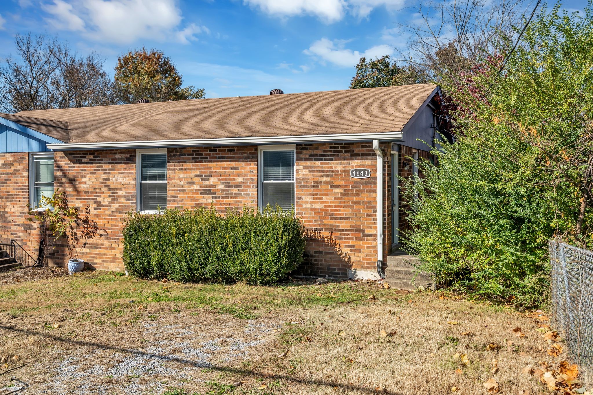 4643 Forest Ridge Drive Hermitage, TN 37076 - Photo 3 of 32 a front view of a house with garden