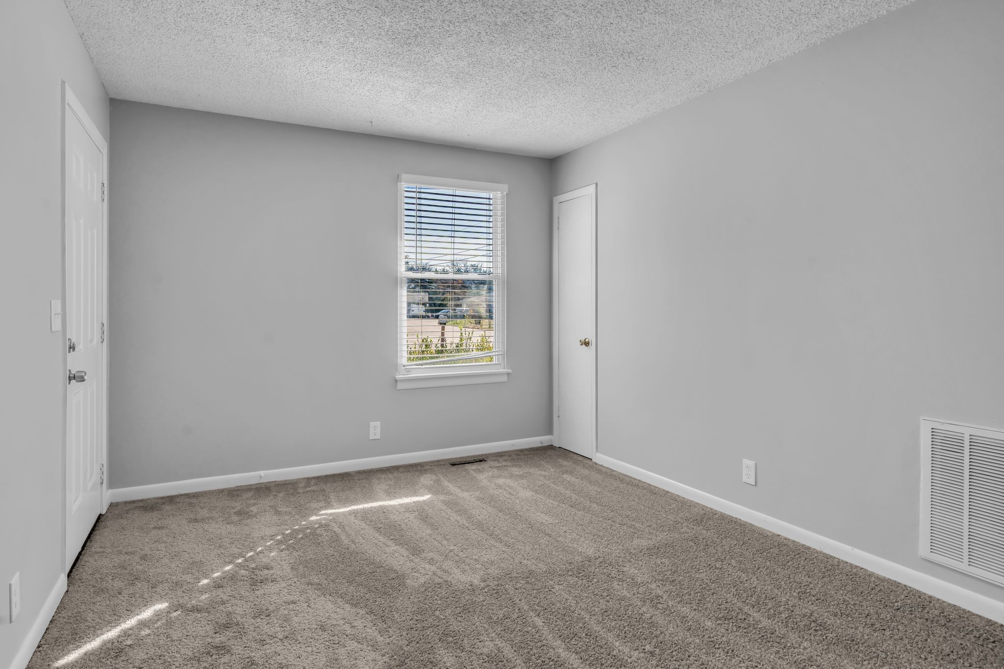 4643 Forest Ridge Drive Hermitage, TN 37076 - Photo 7 of 32 a view of an empty room with a window