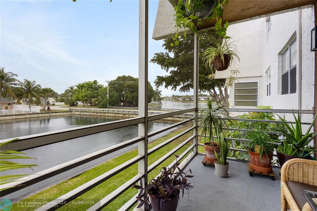 9400 Lime Bay Boulevard, Unit 214 Tamarac, FL 33321 - Photo 11 of 17 a view of balcony with furniture