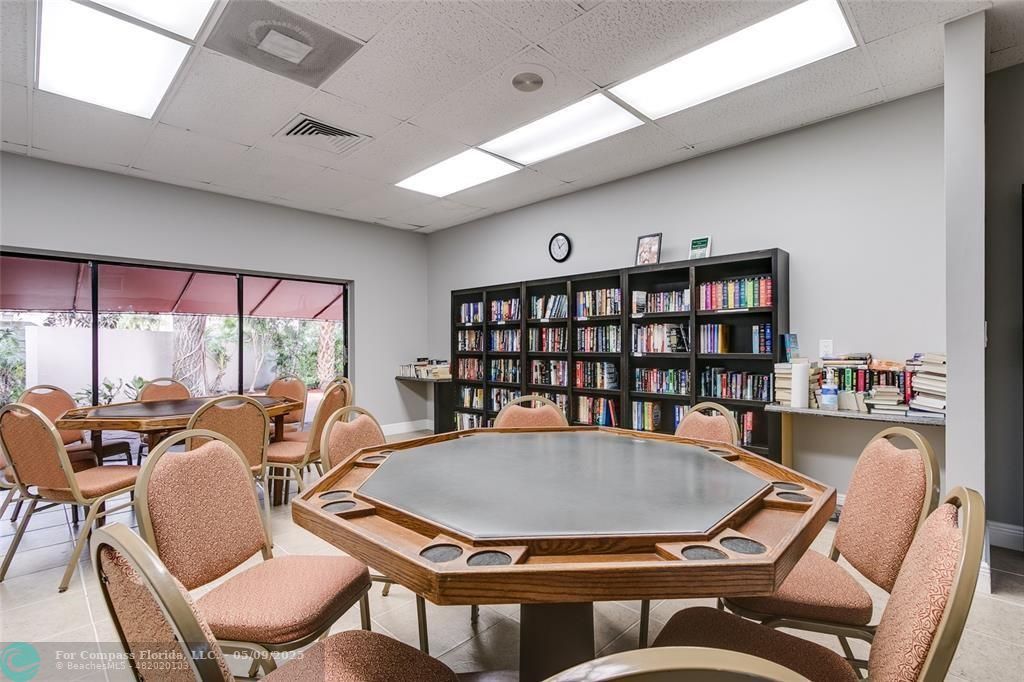9400 Lime Bay Boulevard, Unit 214 Tamarac, FL 33321 - Photo 13 of 17 a outdoor dining room with furniture