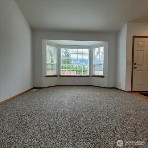a view of staircase with lots of wooden floor