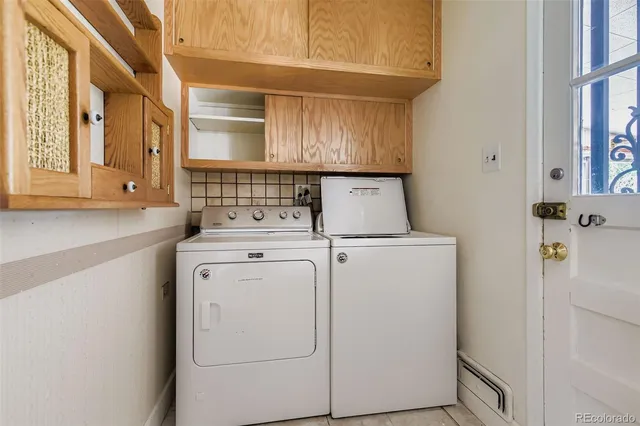 a utility room with dryer and washer