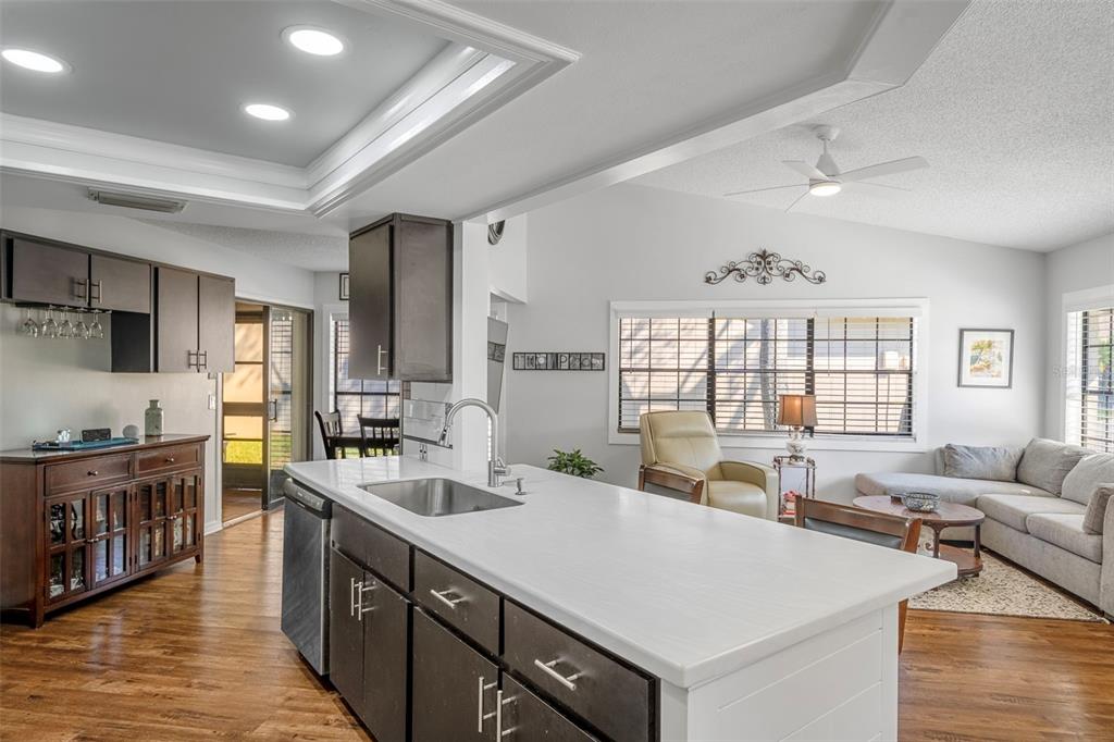 6732 Oak Cluster Circle Spring Hill, FL 34606 - Photo 15 of 65 a large white kitchen with a large window
