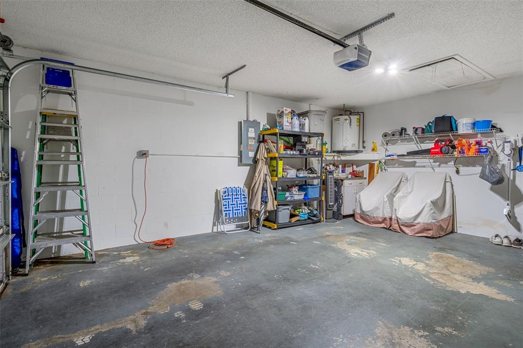 6732 Oak Cluster Circle Spring Hill, FL 34606 - Photo 35 of 65 a view of storage and utility room