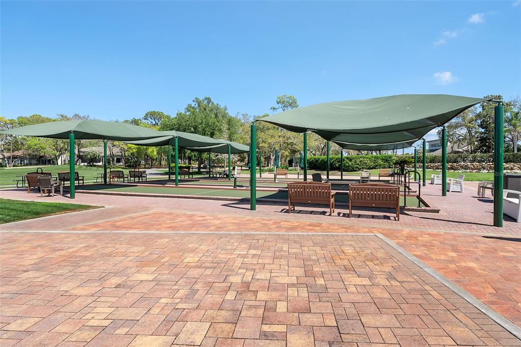 6732 Oak Cluster Circle Spring Hill, FL 34606 - Photo 49 of 65 a view of a building with a patio