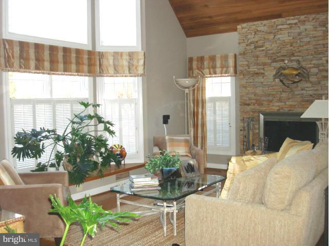 110 South River Landing Road, Unit 110 Edgewater, MD 21037 - Photo 3 of 30 a living room with furniture and a large window