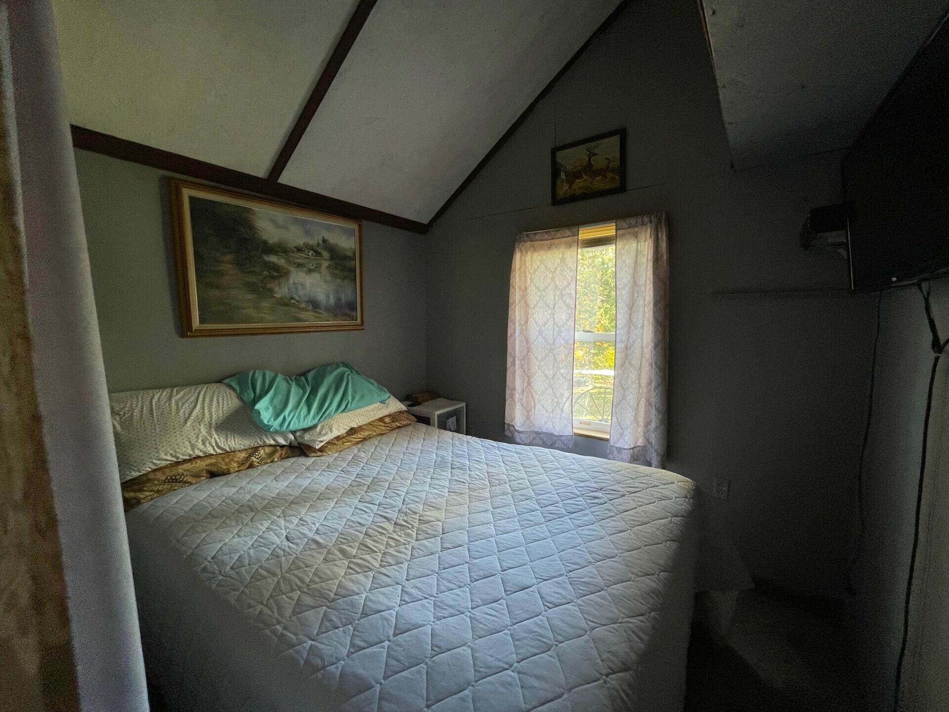 290 Long Pond Road Jackman, ME 04945 - Photo 5 of 22 First floor bedroom