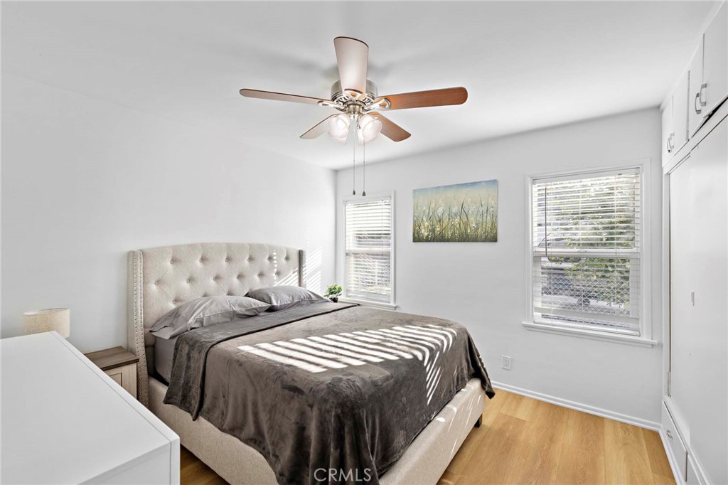 720 East Foothill Boulevard Glendora, CA 91741 - Photo 20 of 37 a bedroom with a bed and a window