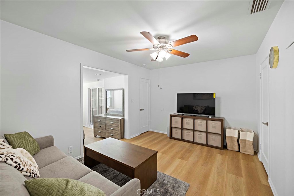 720 East Foothill Boulevard Glendora, CA 91741 - Photo 23 of 37 a living room with furniture and a flat screen tv