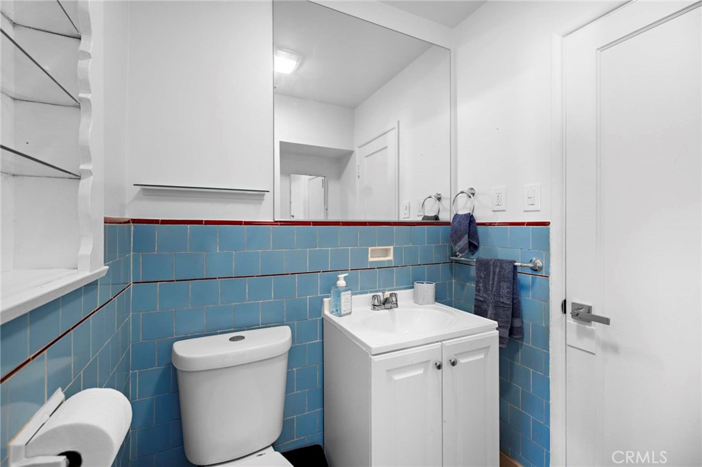 720 East Foothill Boulevard Glendora, CA 91741 - Photo 26 of 37 a bathroom with a sink and a toilet