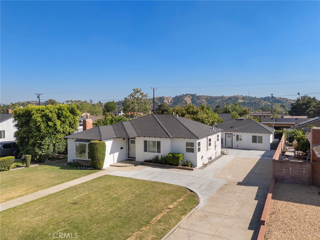 720 East Foothill Boulevard Glendora, CA 91741 - Photo 3 of 37 an aerial view of a house with swimming pool