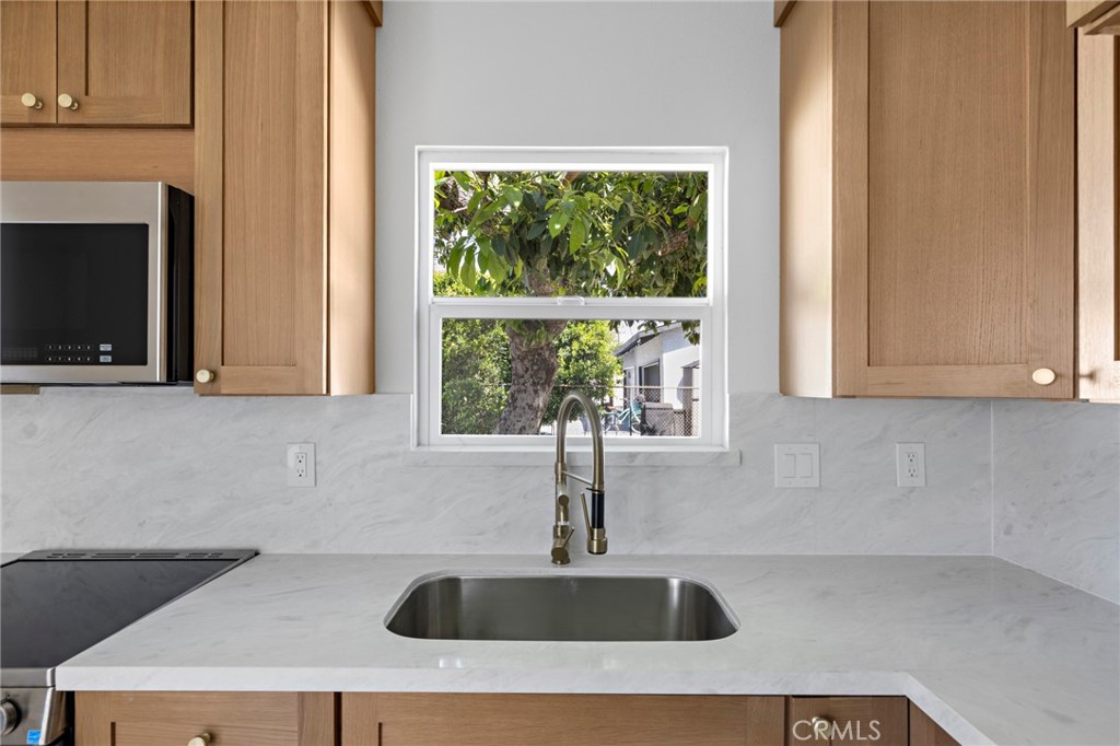 720 East Foothill Boulevard Glendora, CA 91741 - Photo 32 of 37 a kitchen with a sink and a window