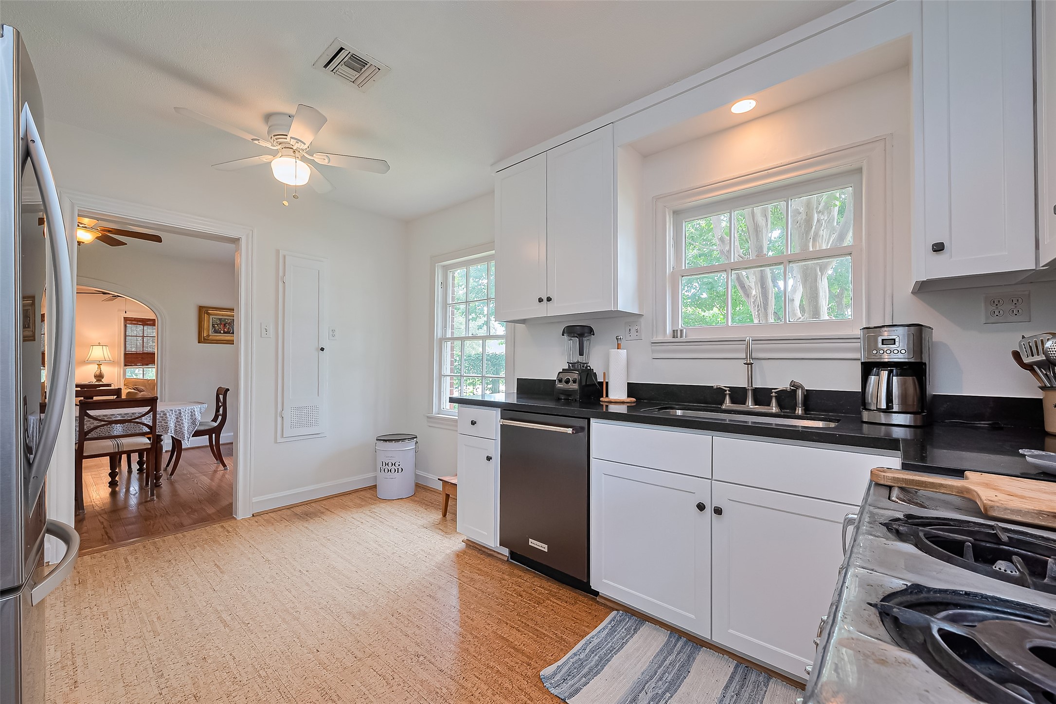 501 Gale Street Houston, TX 77009 - Photo 15 of 49 a kitchen with a sink appliances and cabinets