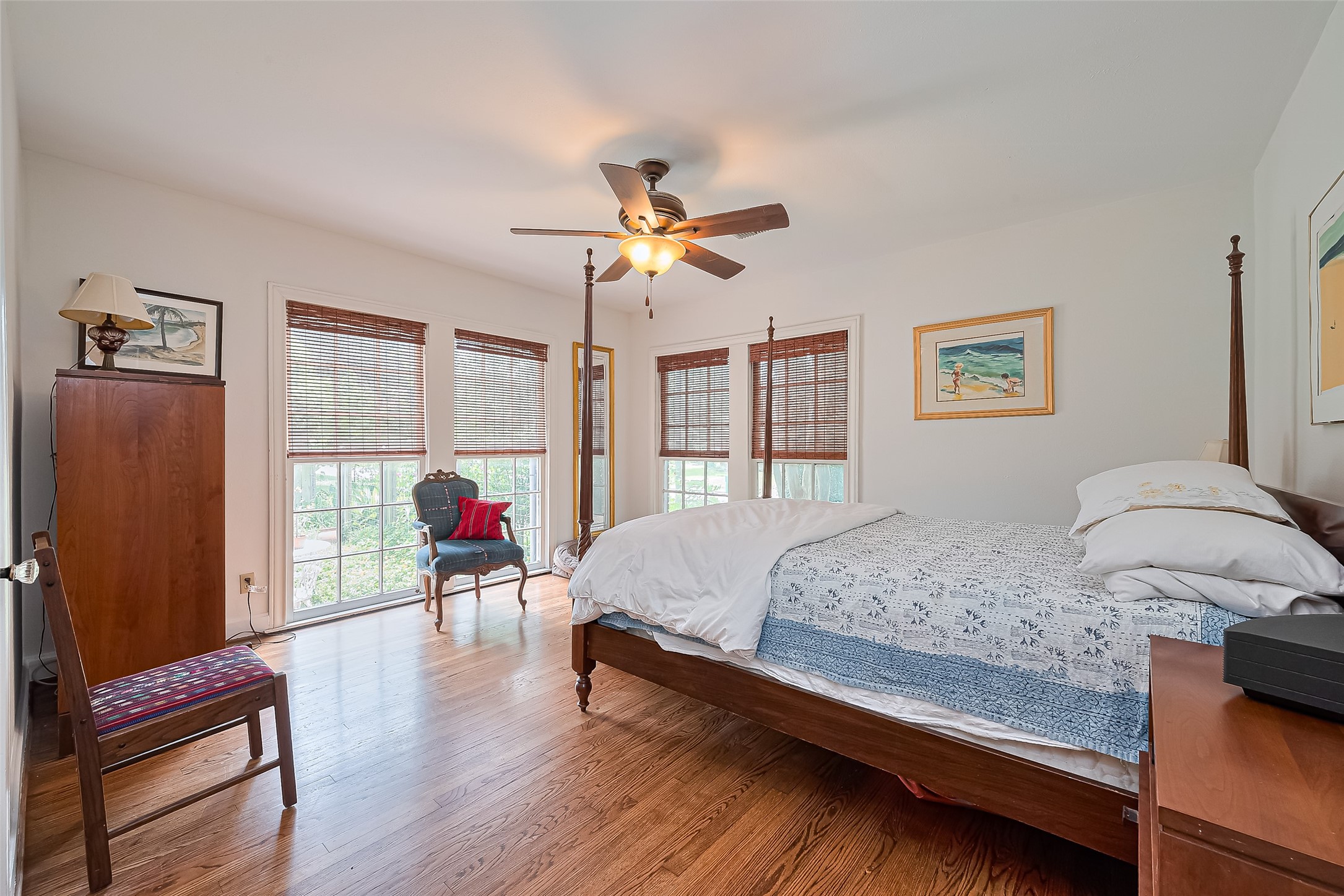 501 Gale Street Houston, TX 77009 - Photo 17 of 49 a bedroom with a bed and a chandelier