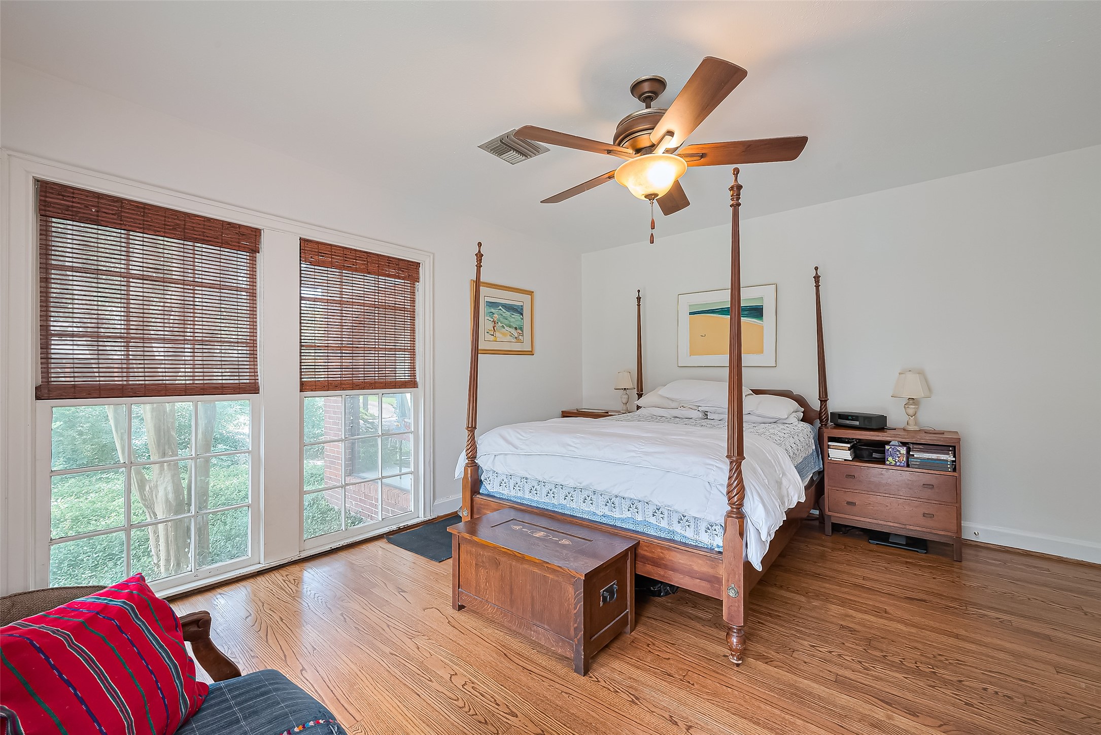 501 Gale Street Houston, TX 77009 - Photo 18 of 49 a bedroom with a bed and wooden floor