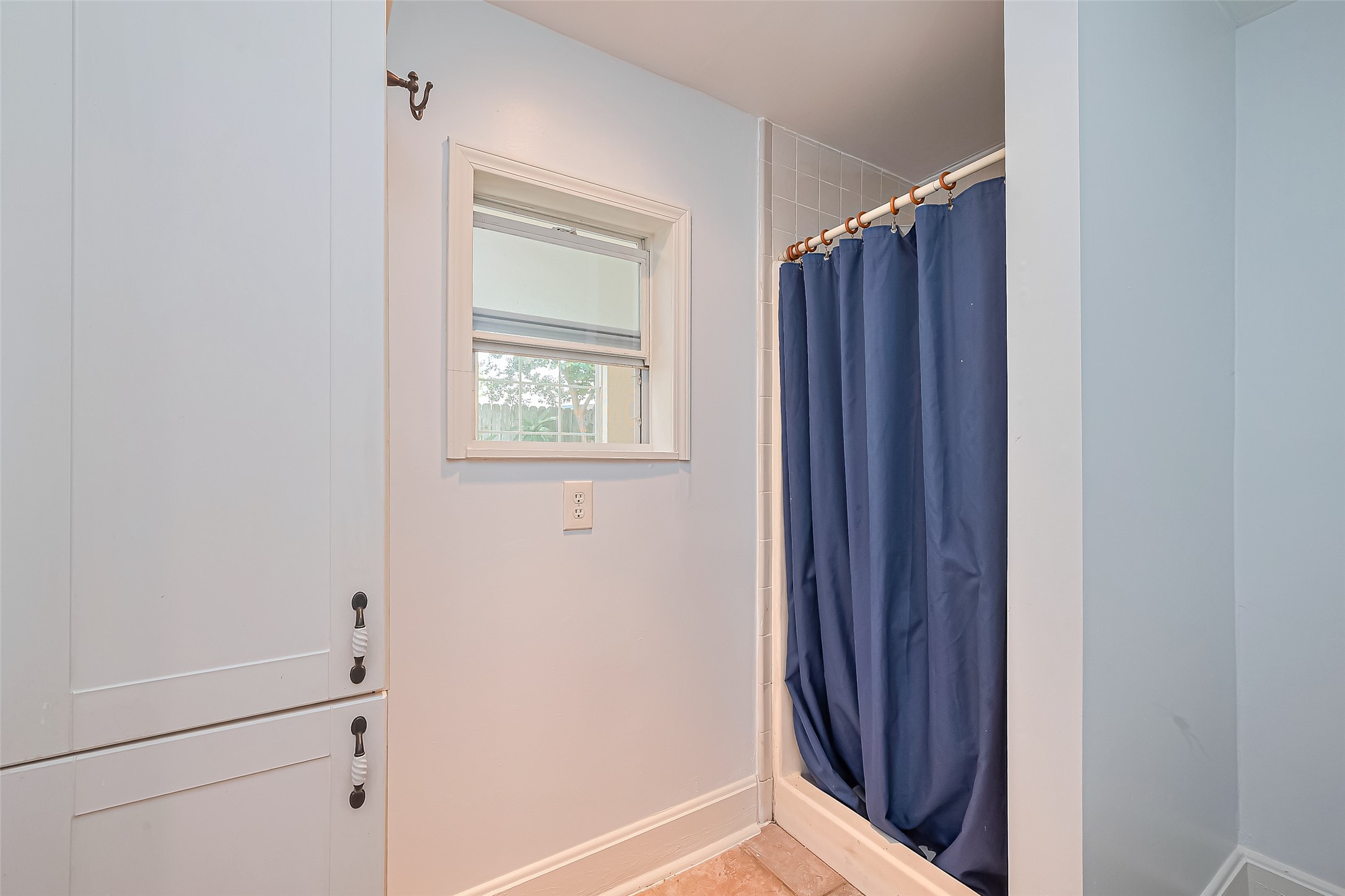 501 Gale Street Houston, TX 77009 - Photo 36 of 49 a view of an empty room with wooden floor and a window