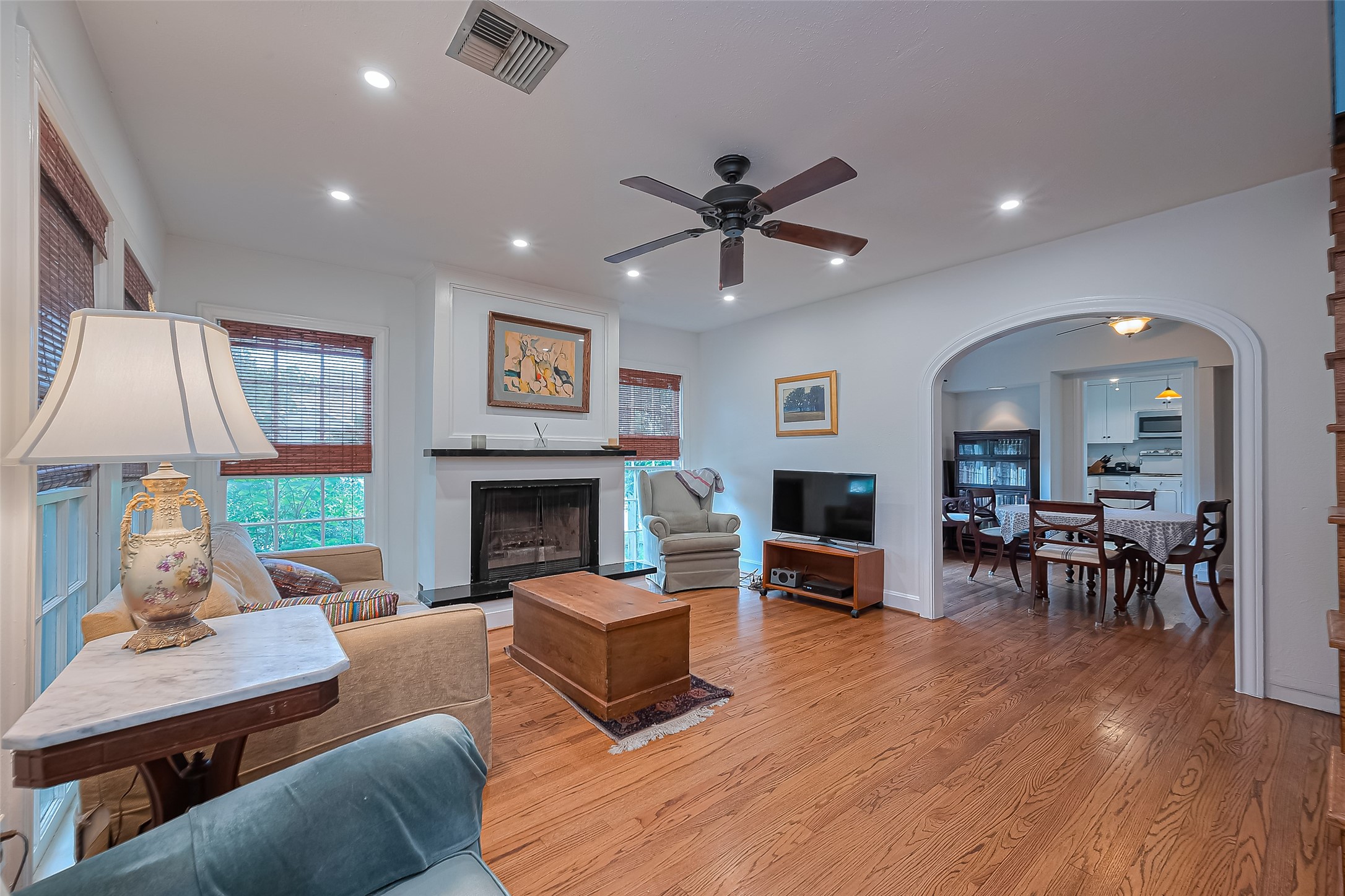 501 Gale Street Houston, TX 77009 - Photo 8 of 49 a living room with furniture a fireplace and a table