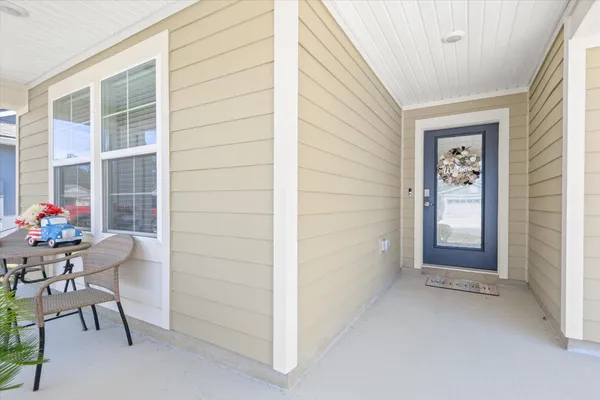 a kitchen with a sink a stove and cabinets