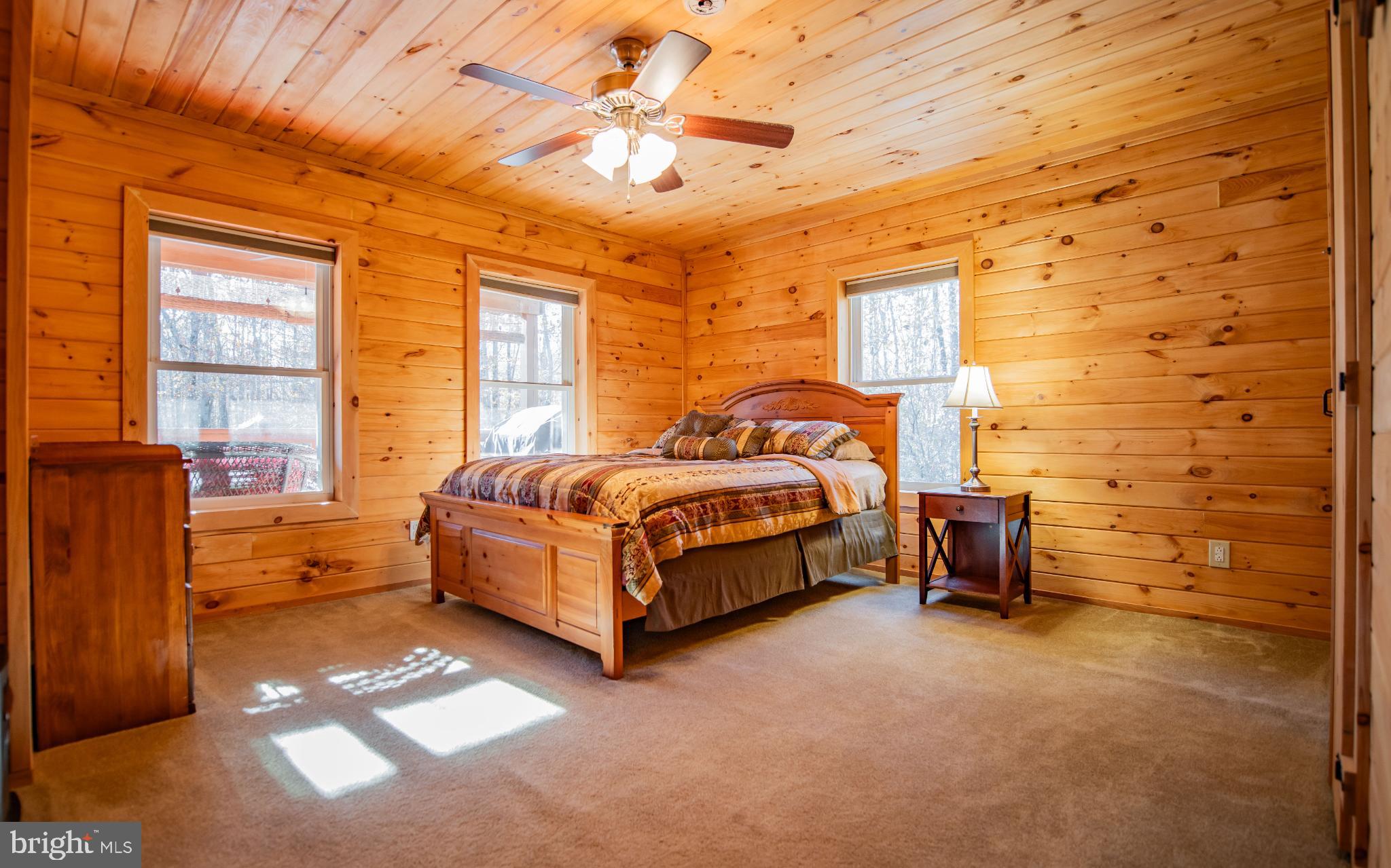 115 Glory Rdg Road Shunk, PA 17768 - Photo 10 of 35 Cozy wooden retreat with natural light.