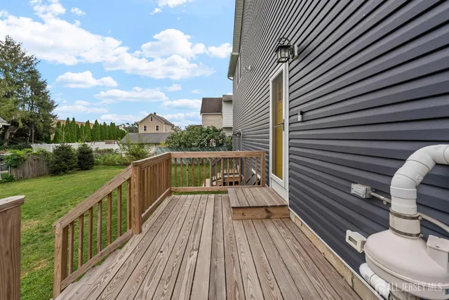 a view of a porch with wooden floor