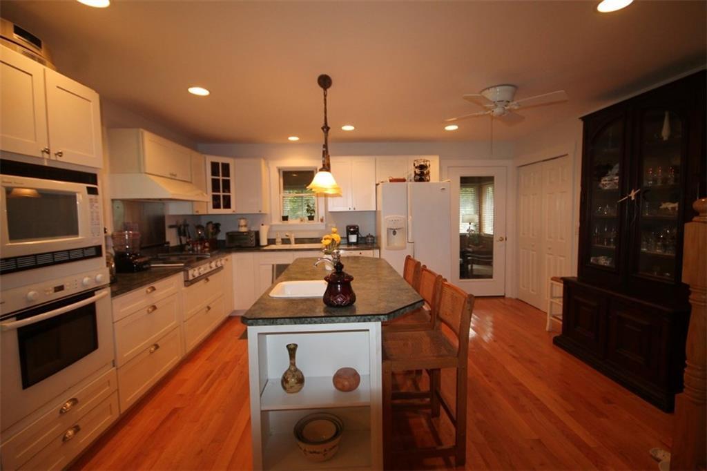 24 Shackleton's Way Boothbay, ME 04537 - Photo 8 of 25 The kitchen with ceiling fan, white...