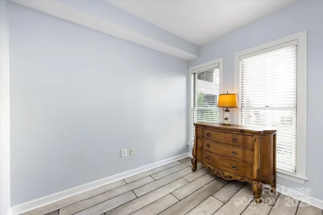 a view of dresser and window