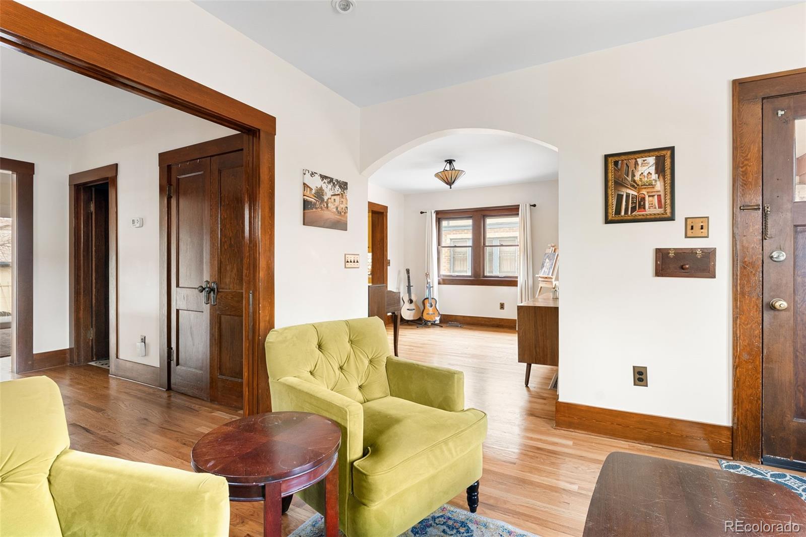 1959 South Washington Street Denver, CO 80210 - Photo 11 of 50 a living room with furniture and a wooden floor