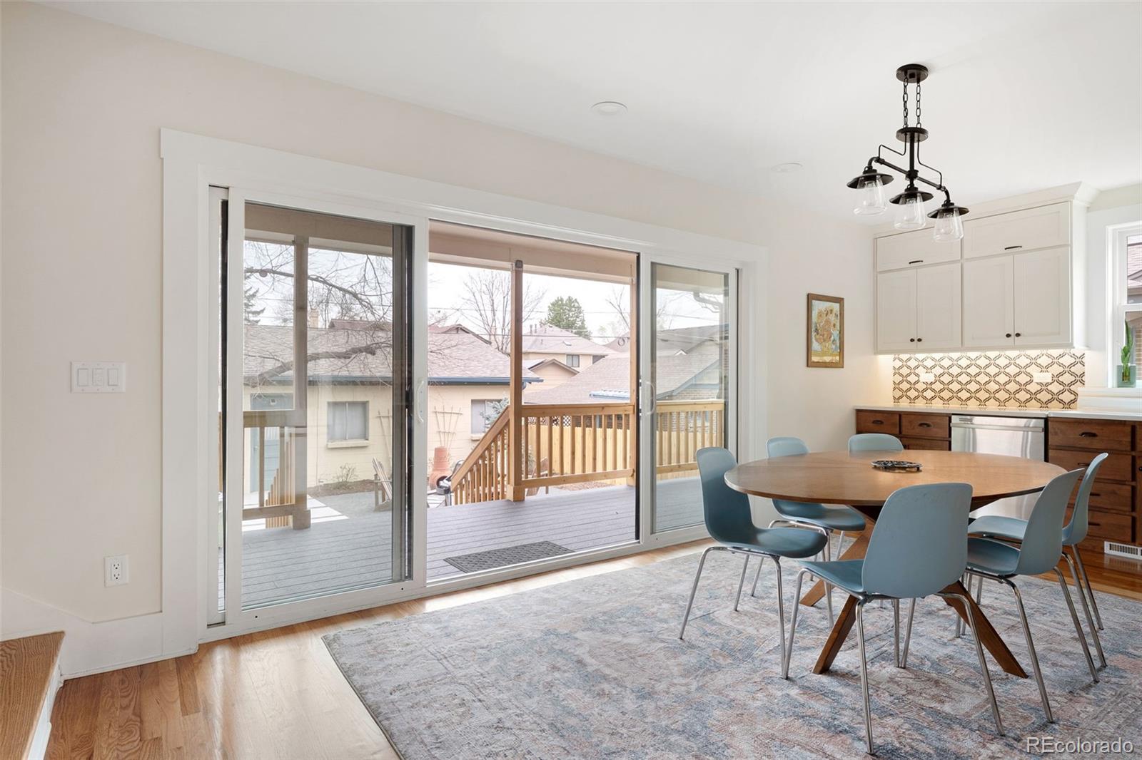 1959 South Washington Street Denver, CO 80210 - Photo 24 of 50 a view of a dining room with furniture window and outside view
