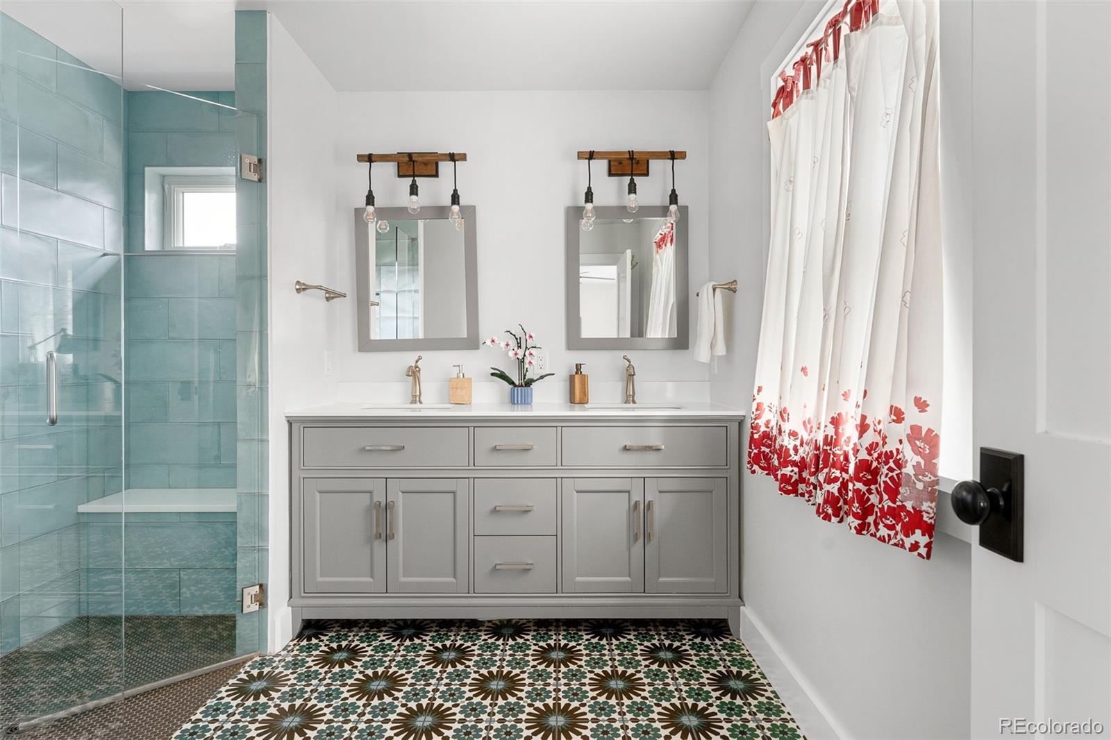 1959 South Washington Street Denver, CO 80210 - Photo 29 of 50 a bathroom with a sink and a mirror