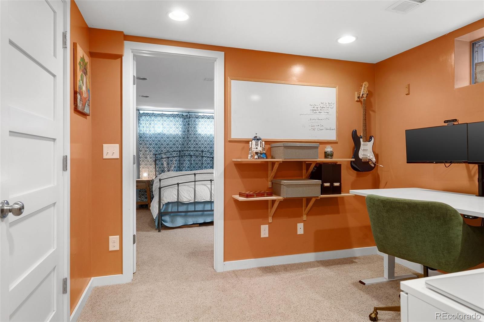 1959 South Washington Street Denver, CO 80210 - Photo 38 of 50 a room with furniture and a window