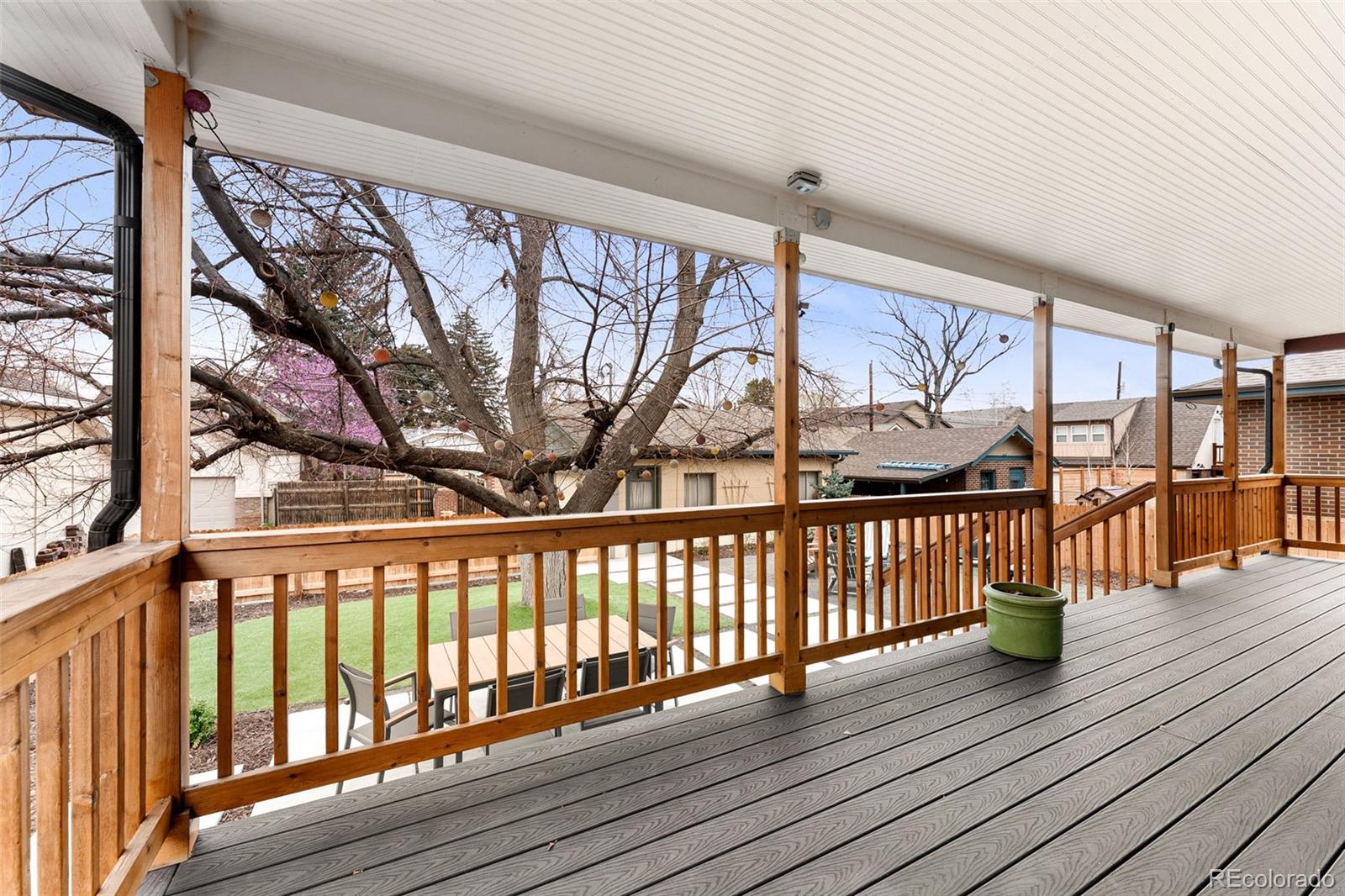 1959 South Washington Street Denver, CO 80210 - Photo 45 of 50 a view of a porch with wooden floor and iron stairs