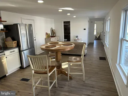 a view of a dining room with furniture