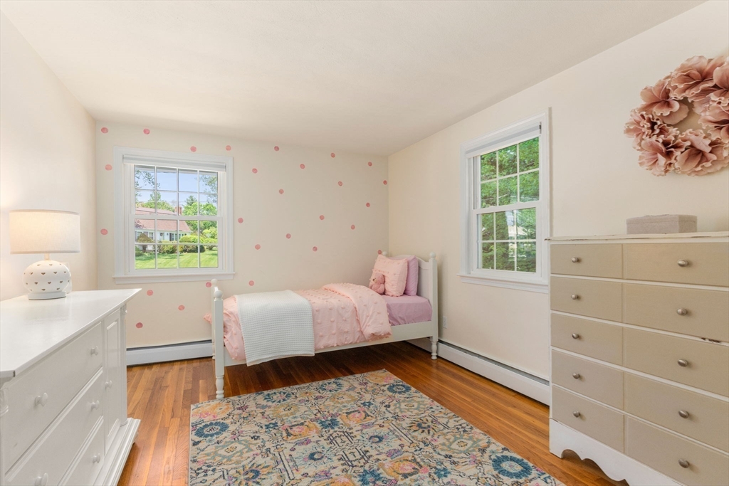 11 Longmeadow Road Medfield, MA 02052 - Photo 15 of 39 a bed room with a bed and a window