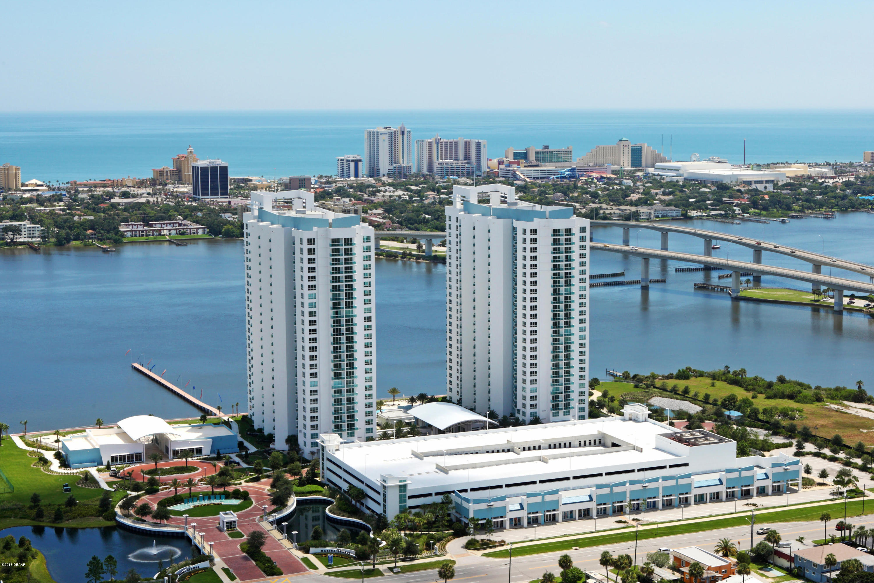 241 Riverside Drive, Unit 1409 Holly Hill, FL 32117 - Photo 2 of 35 a view of a city with tall buildings