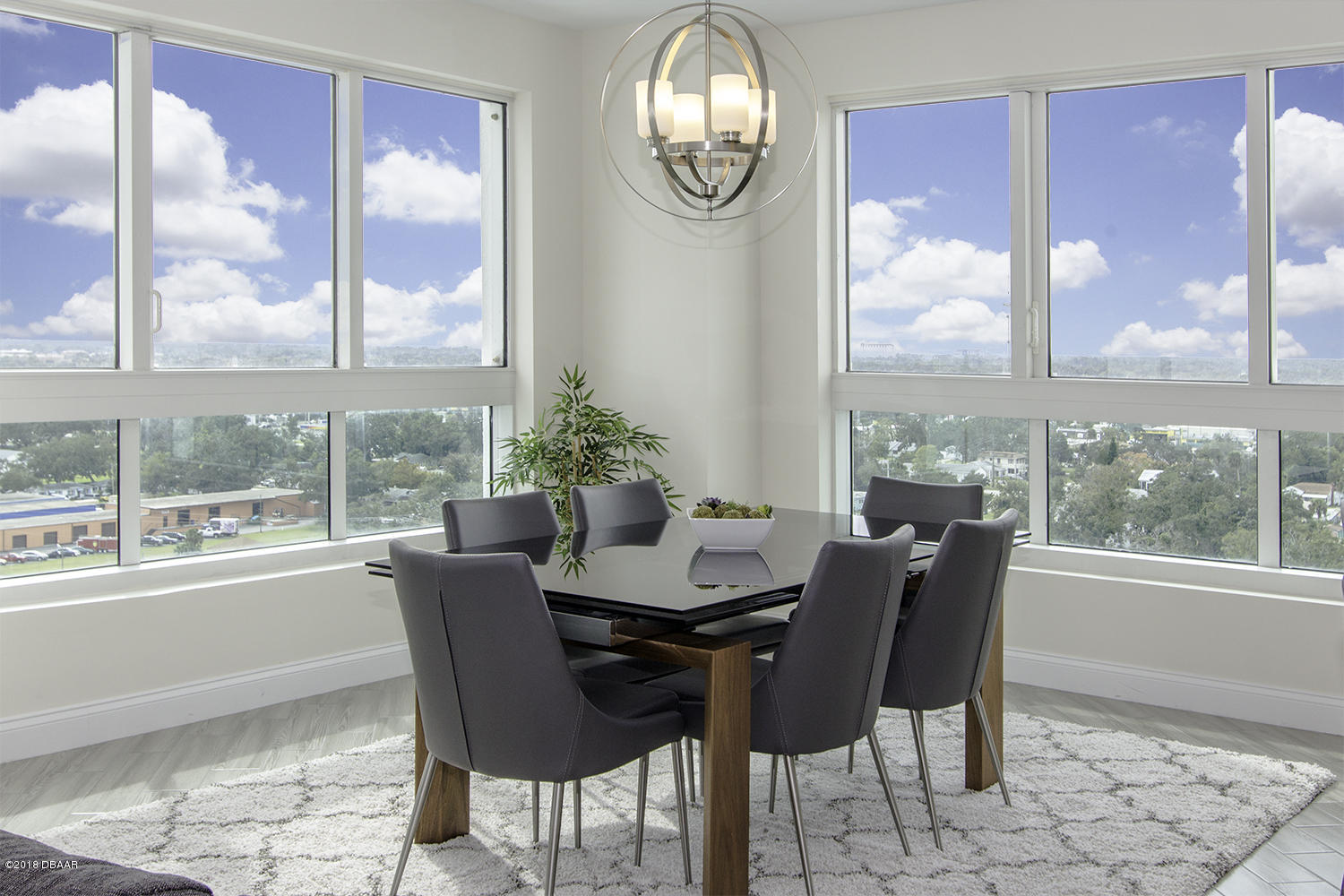241 Riverside Drive, Unit 1409 Holly Hill, FL 32117 - Photo 8 of 35 a dining room with furniture window and outside view