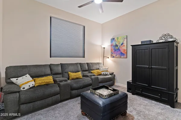 a view of swimming pool outdoor seating and city view