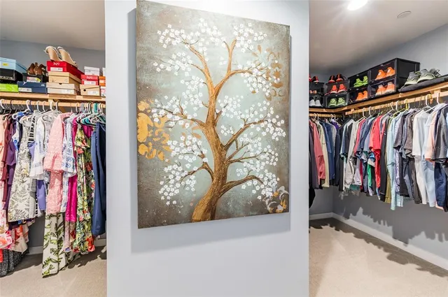 a bedroom with bed and balcony view