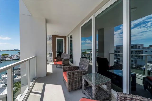 a view of a lake with tall buildings