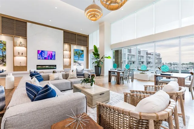 a room with pool table and windows