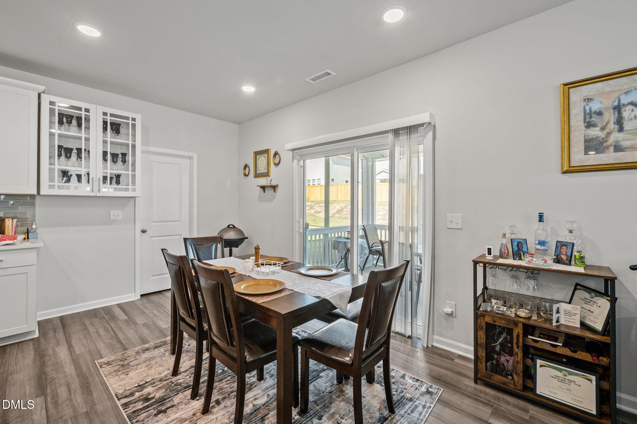 3000 Farndale Trace Durham, NC 27712 - Photo 10 of 36 a view of a dining room with furniture window and wooden floor